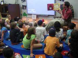 Mr. Plemmons reads Fireboat by Maira Calman.  The story tells about a retired fireboat that sprang into action on September 11, 2001 to help firefighters pump water to the fires in NYC.