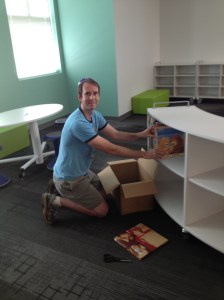 I had the honor of putting the very first books on the shelves